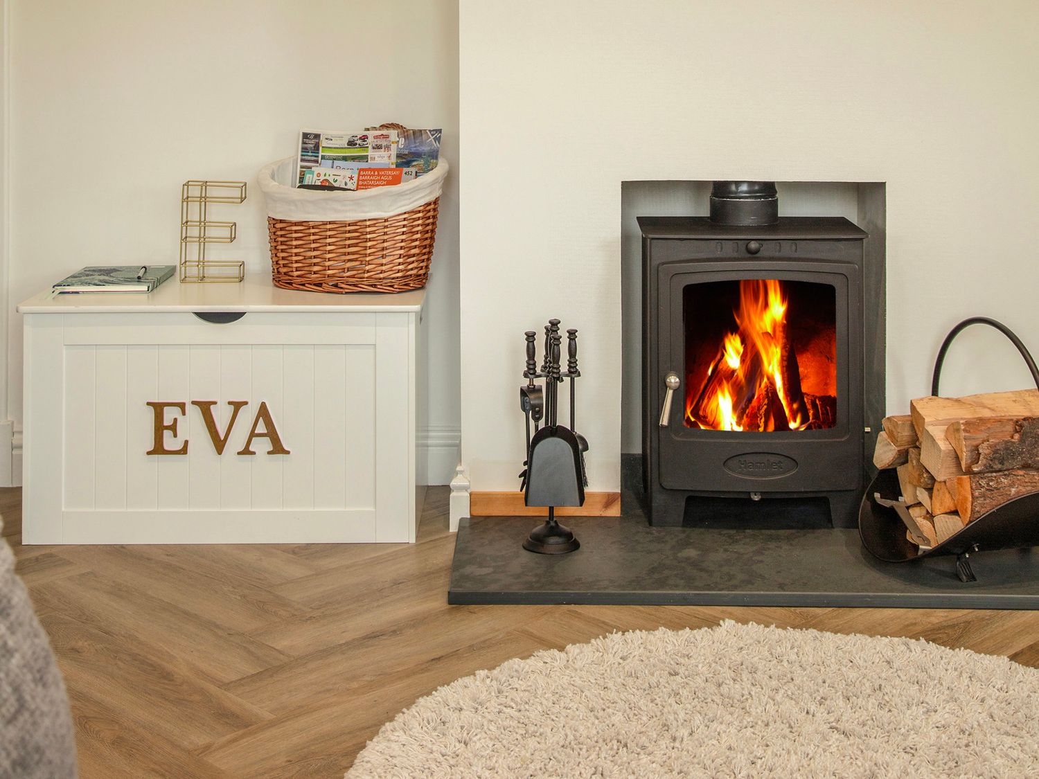 Sitting room with woodburning stove at Taigh Eva