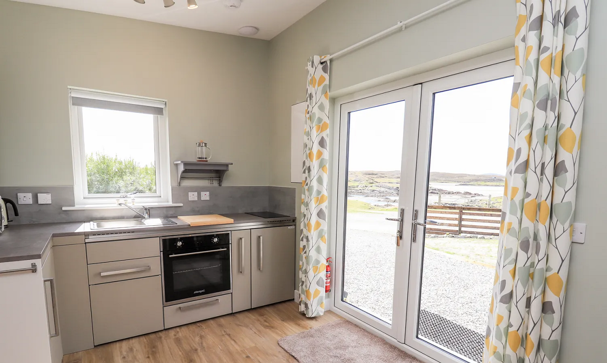 The Wheelhouse kitchen with patio door
