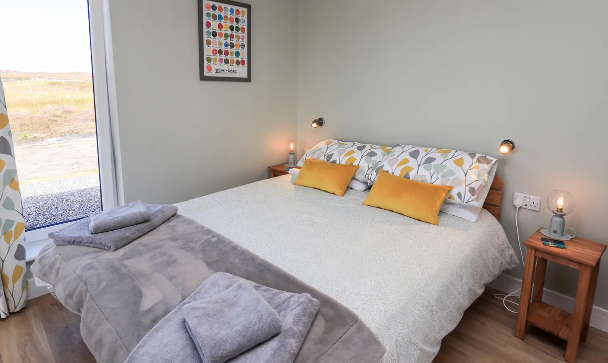 The Wheelhouse double bed with yellow cushions