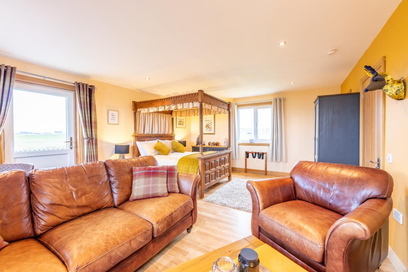 Guest lounge with leather sofas
