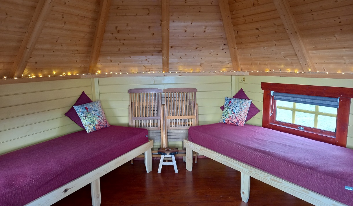 Moorcroft Holidays twin beds in yurt