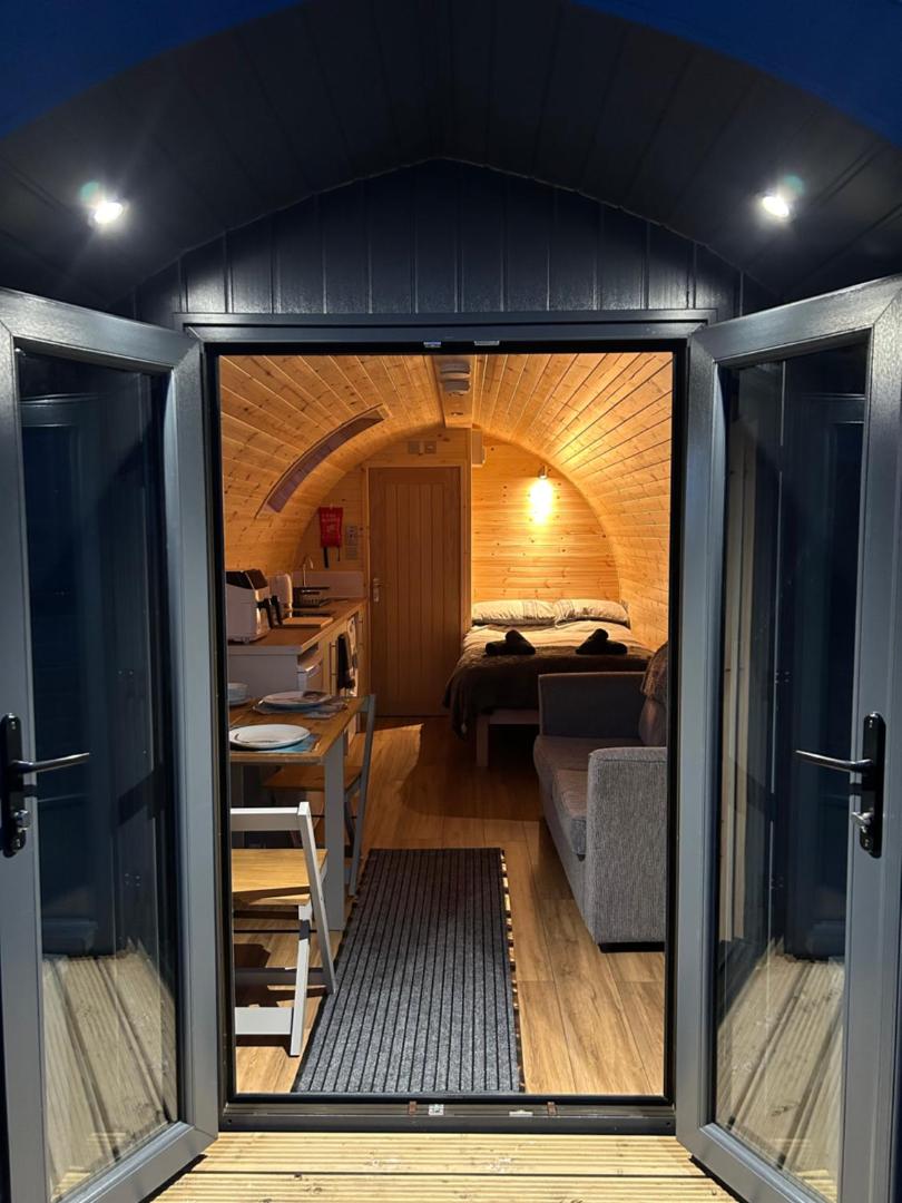 Open doors into the pod at dusk