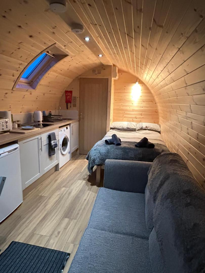 Kitchen and sofa inside the pod