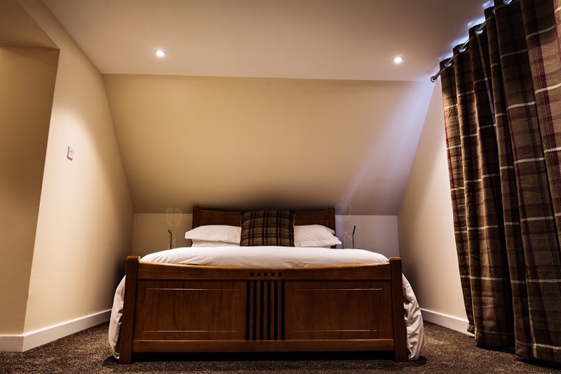 Hebrides House wooden double bed